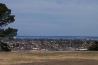 Looking South from the main entrance, across the city of Geelong, to the sea. 