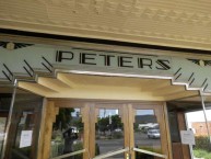 Erected Peters signage above the Roxy Cafe Bingara 