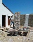 Grammos re-building the piers for the pergola in the courtyard of the Kythera Municipal Library 