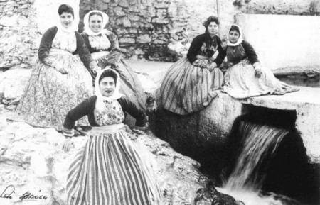 Kytherian women wearing the traditional spaleta. 