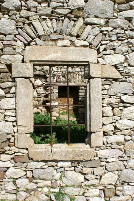 Windowframe old building at Agios Demetrios 