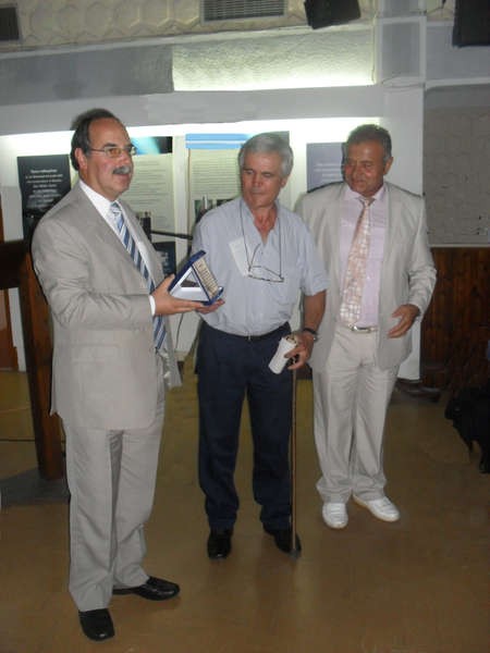 Mayor of Kythera Mr Theodoros Koukoulis (left) presenting a 