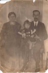 My sister Nina with her Godparents 1921 