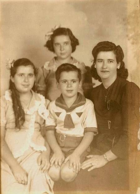 Penelope (Venardou) Conomos, Chrys, Anne, and Tasso 1944 