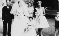Voula Logus (nee, Coroneos) on her wedding day, with attendants. 