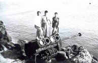 large broken engine and Uncle Ted with others 