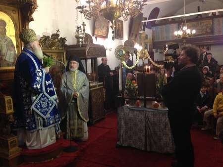 Valerios Kalokerinos video-taping the Archbishop of Kythera 
