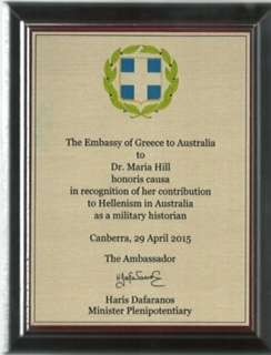 The Award presented to Maria Hill by the Greek Ambassador Charalambos Dafaranos and his wife Eva 
