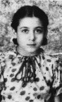 Maria in her cherry dress, aged 10. 