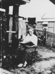 Jack Mavromatis behind his cafe at Goomeri, Queensland, ca. 1928 