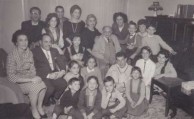 George Lianos surrounded by children and grandchildren 