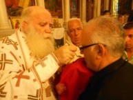 Brisbane Kytherian stalwart, Peter Vamvakaris receives communion 
