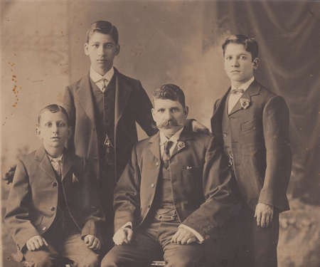 George Margetis, with his sons, left to right, Minas, Bretos, and Jim 